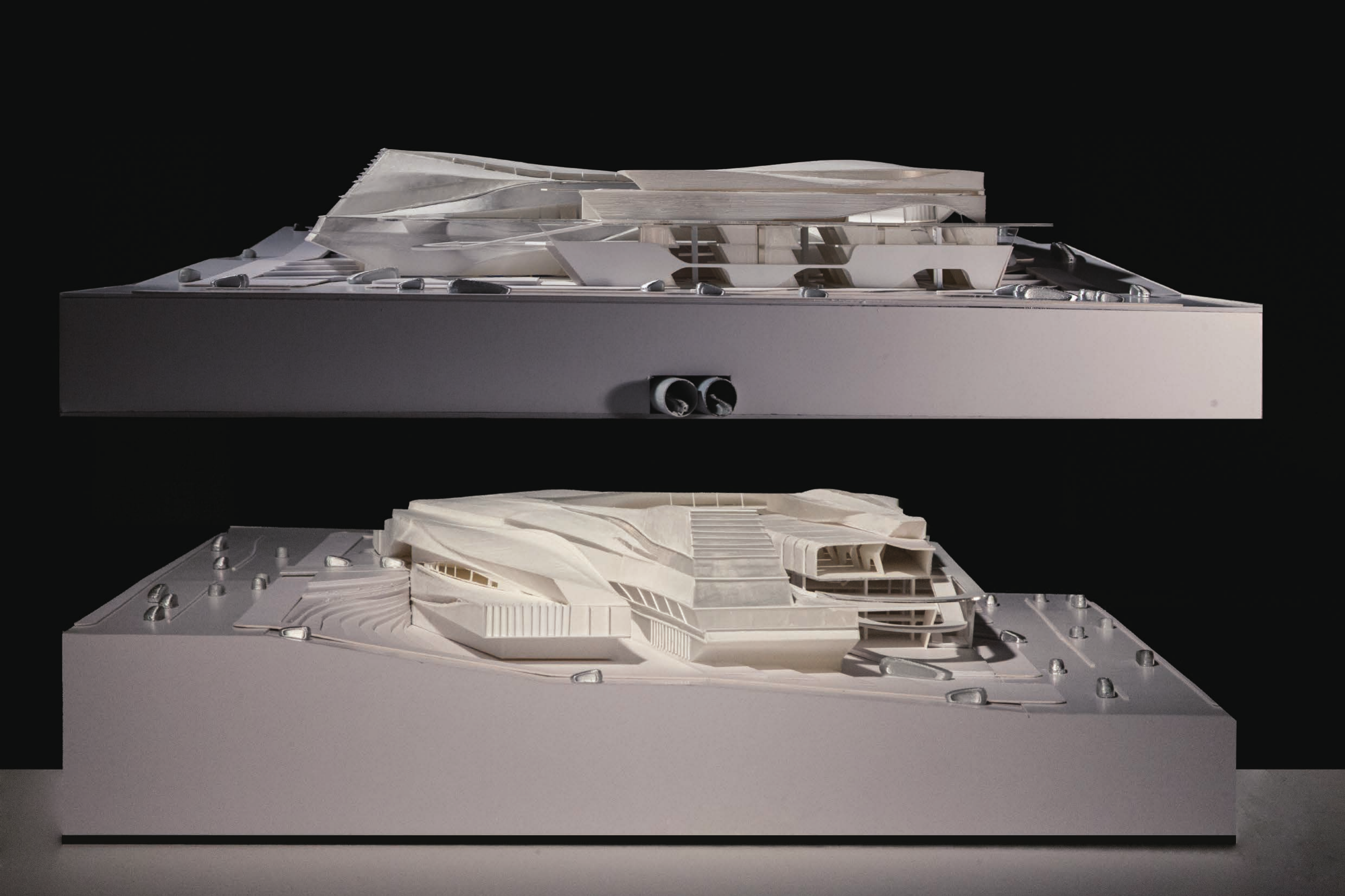 Two physical models showing the project massing
