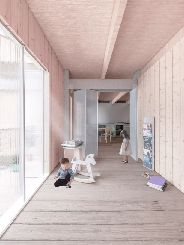 Daylit shared corridor and planted edge within the housing project
