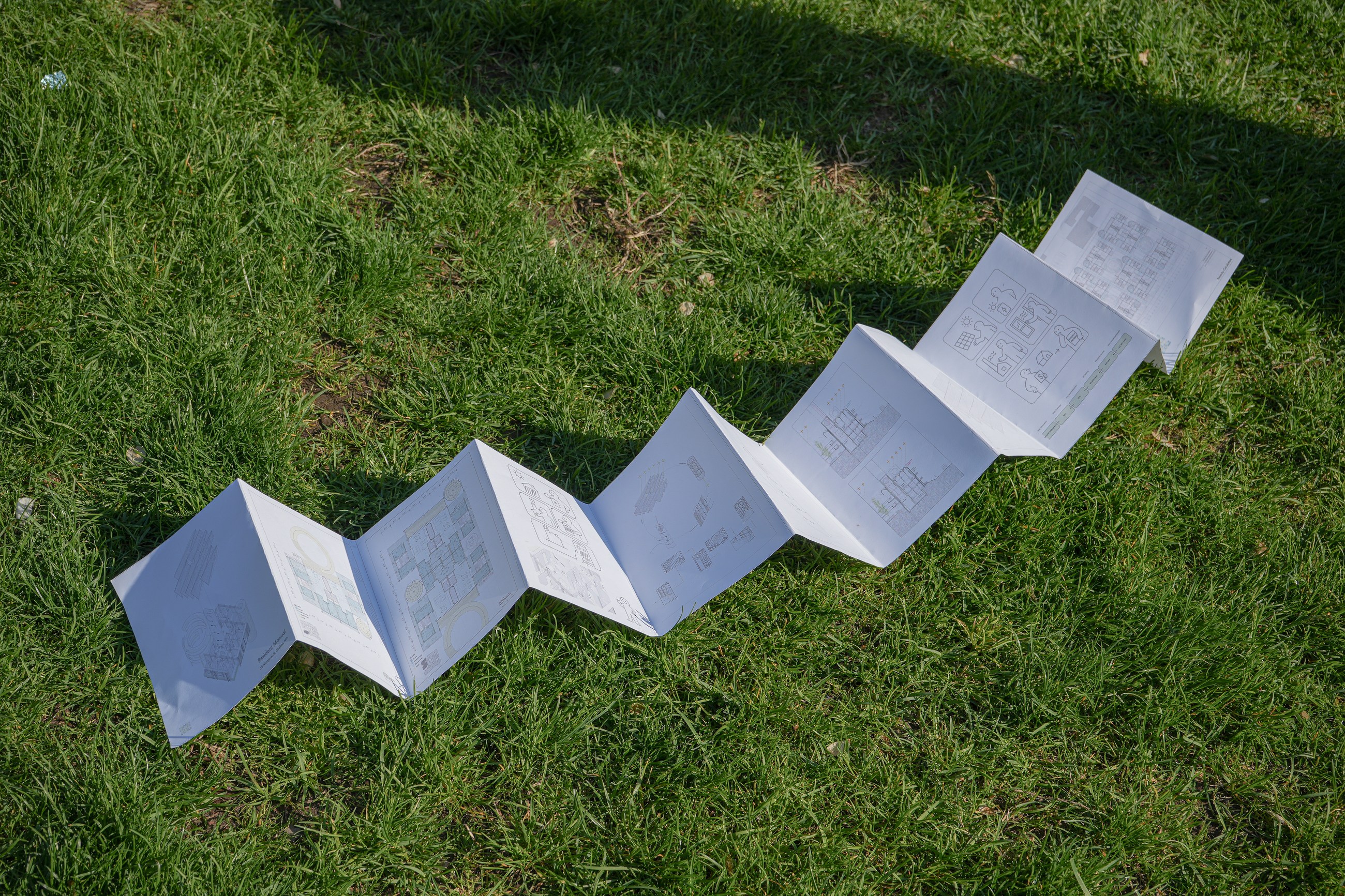 Folded metal study model testing the repeating roof profile
