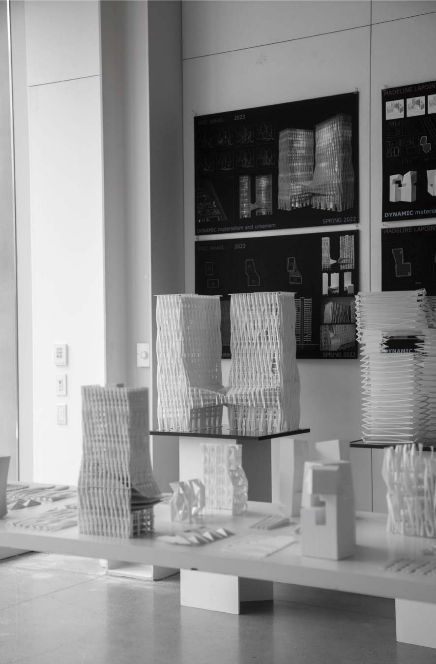 White 3D-printed tower studies displayed in a studio